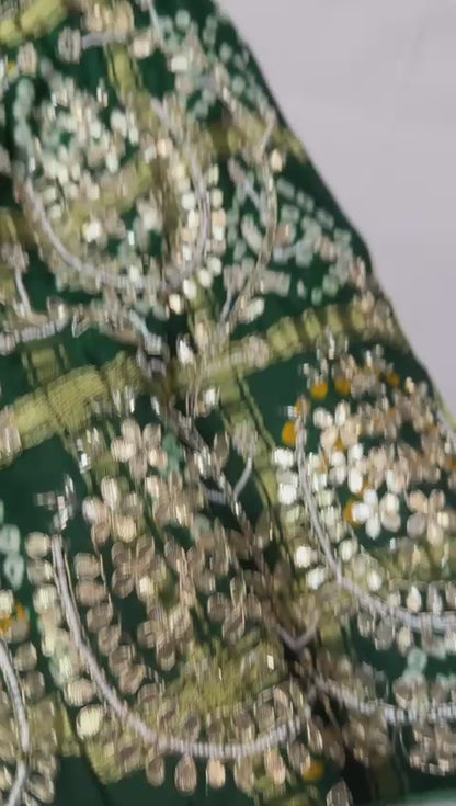 Bandhik | silk bandhej lehenga with gota patti work