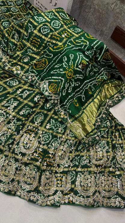 Bandhik | silk bandhej lehenga with gota patti work