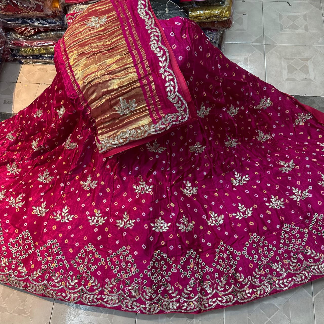 Bishka | gajji silk bandhej lehenga with gota patti work