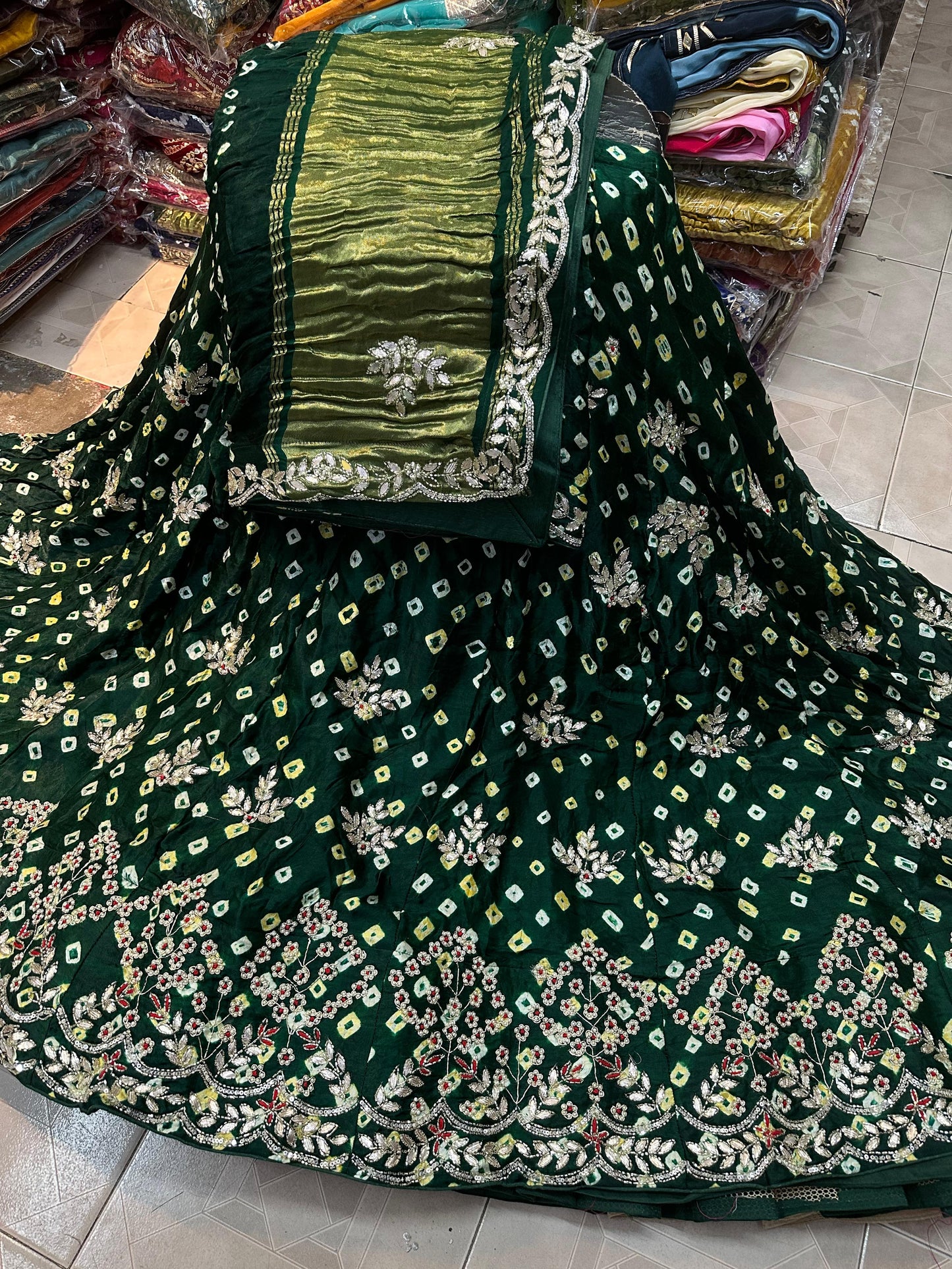 Bishik | gajji silk bandhej lehenga with gota patti work