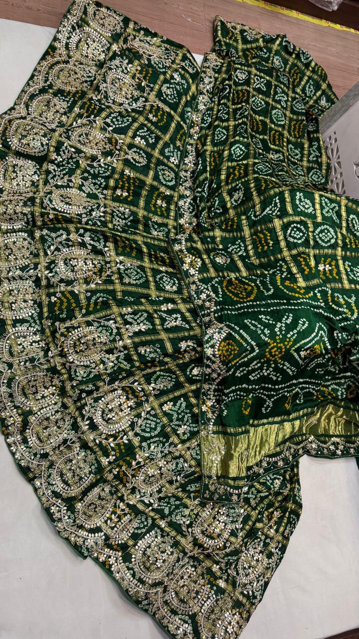 Bandhik | silk bandhej lehenga with gota patti work